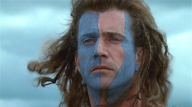 Mel Gibson wearing a blue face paint