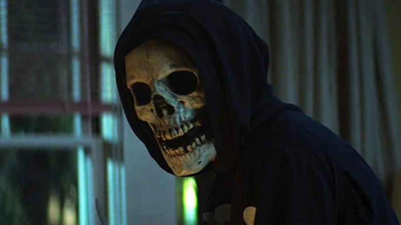 Killer wearing a skull mask