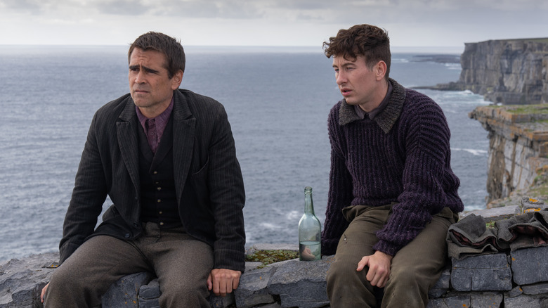 Padraic and Dominic sitting on wall