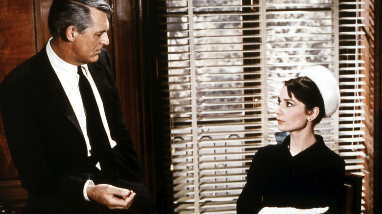 Cary Grant and Audrey Hepburn looking at each other