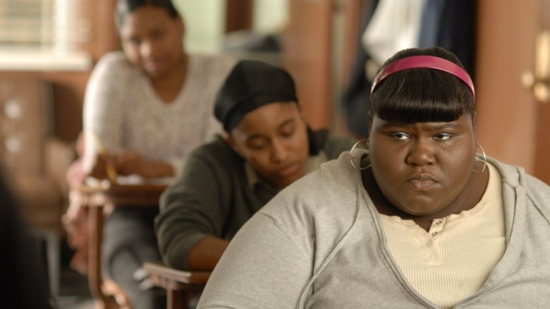 Gabourey Sidibe seated