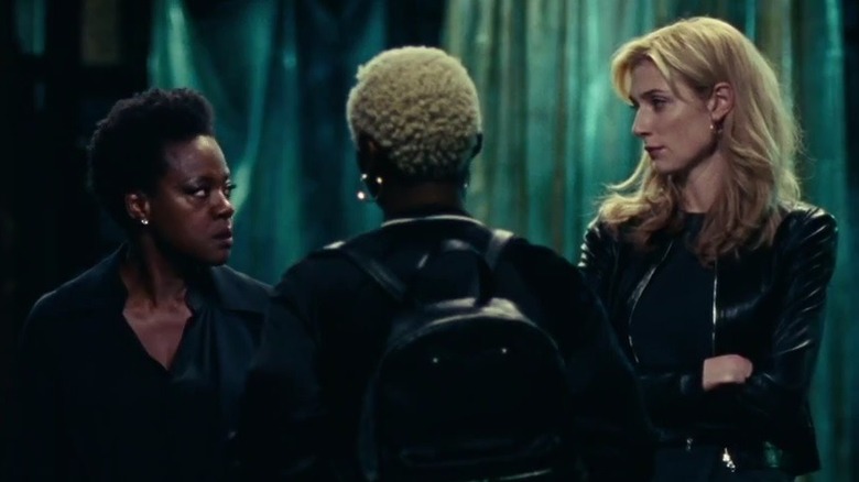 Viola Davis and Elizabeth Debicki watching one another