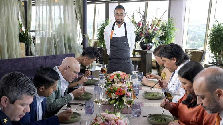 Chef in front of table