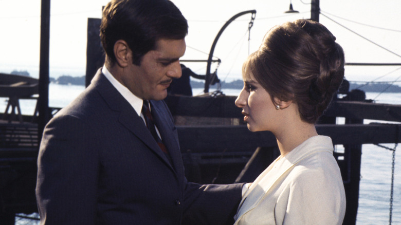 Nicky and Fanny talking by boats (1968)