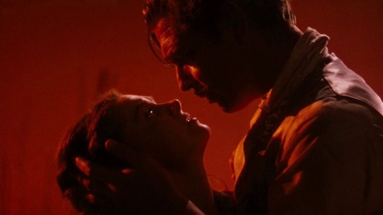 Rhett Butler dipping Scarlett O'Hara back and holding her head