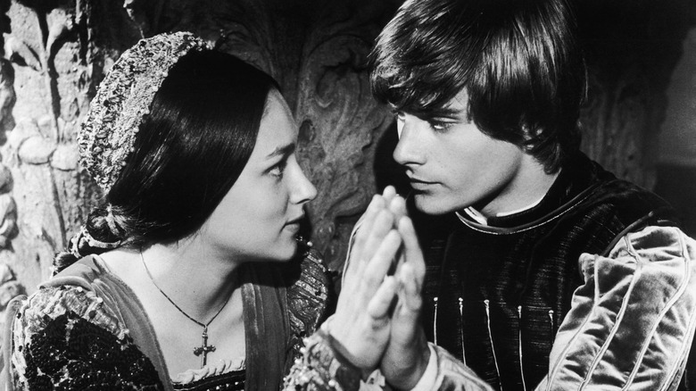 Romeo and Juliet touching palms enraptured (1968)