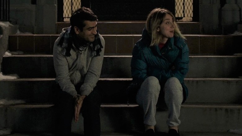 Kumail and Emily on steps in The Big Sick