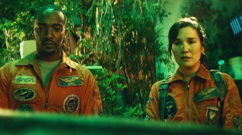 Jane and Adam wearing flightsuits