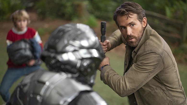 Ryan Reynolds wields weapon