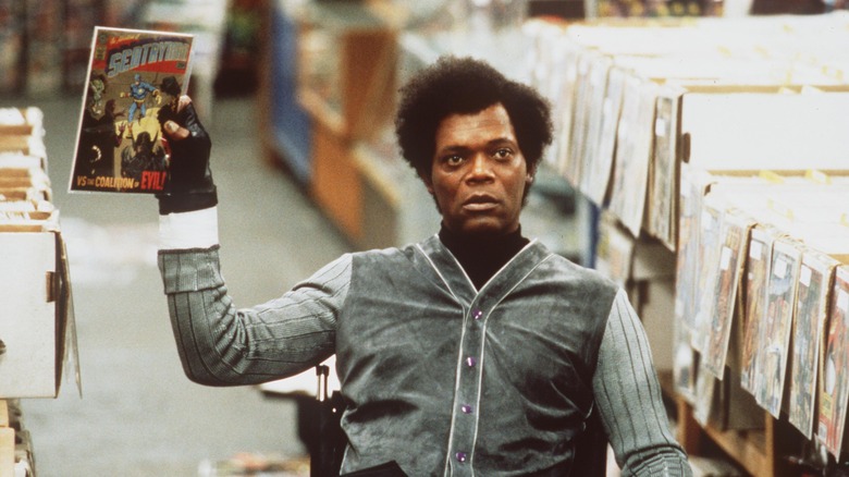 Samuel L. Jackson holds comic book