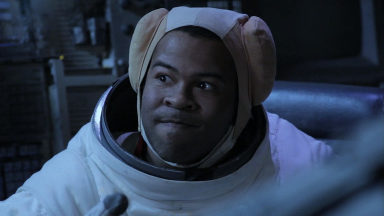 Jordan Peele wearing astronaut suit