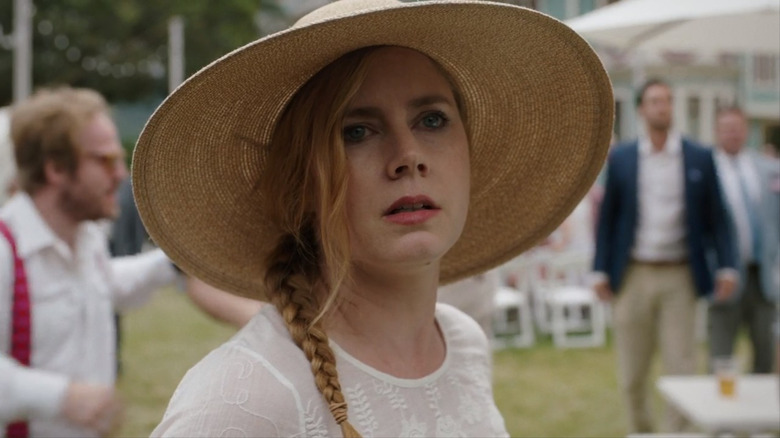 Camille Preaker wearing sun hat