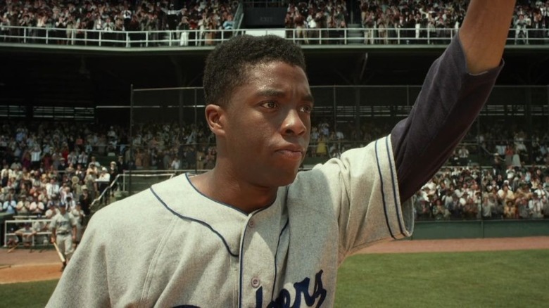 Jackie Robinson waves to crowd