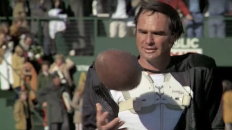 Paul Crewe tosses football