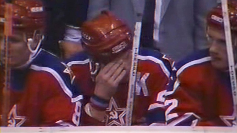 Russian hockey players sitting