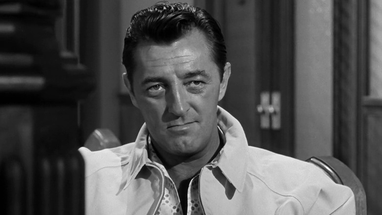 Robert Mitchum scowling