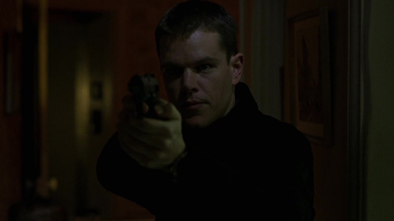 Matt Damon pointing gun