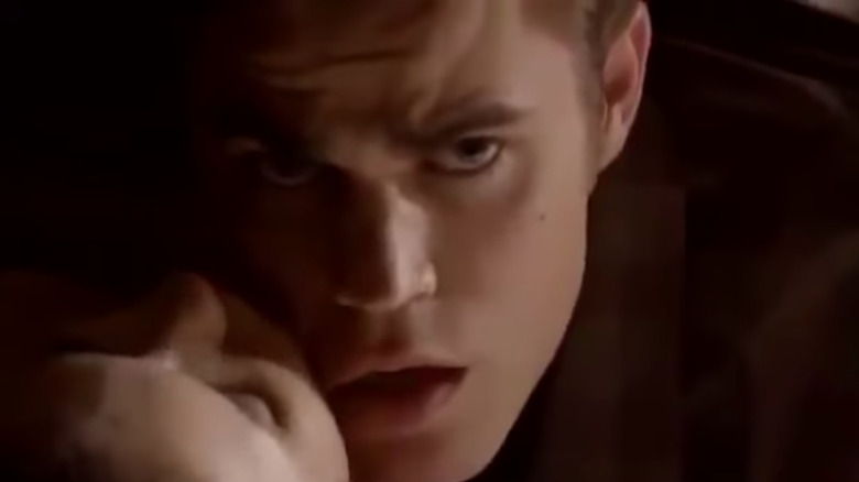 The Vampire Diaries Stefan looking up from Elena