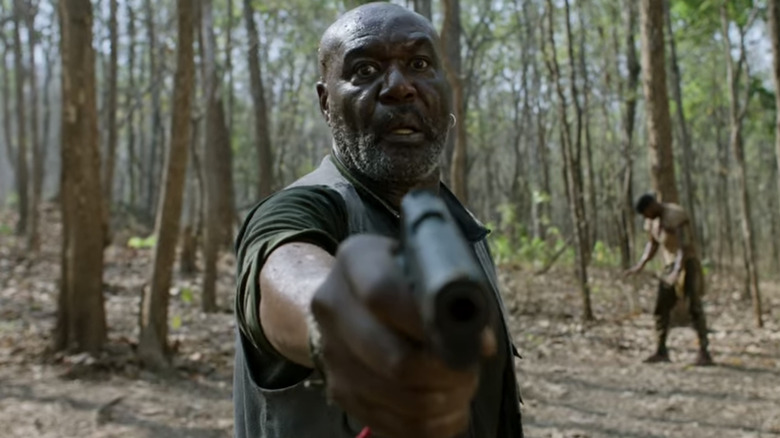 Delroy Lindo points gun