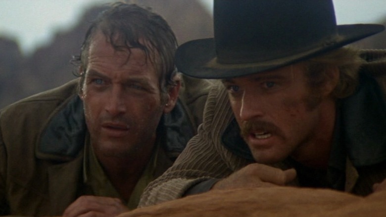 Butch Cassidy and the Sundance Kid look at posse