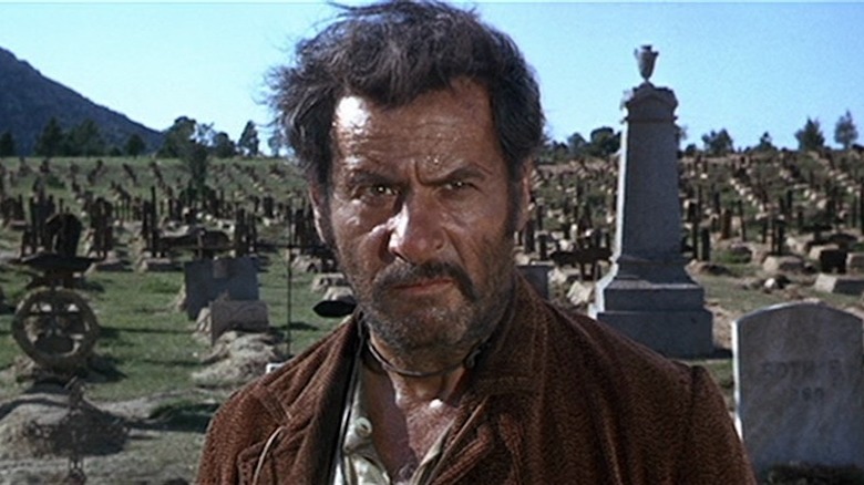 Tuco Ramírez stands in graveyard