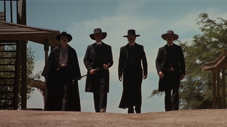 Doc Holliday and Earp brothers walk