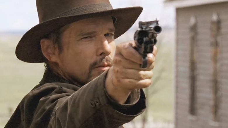 Ethan Hawke aims gun