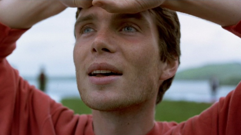 Cillian Murphy as Jim looks at sky