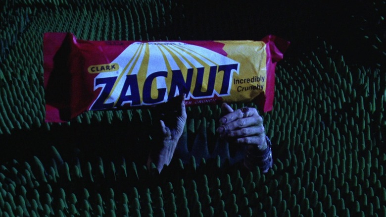 Betelgeuse's hands holding up a giant Zagnut