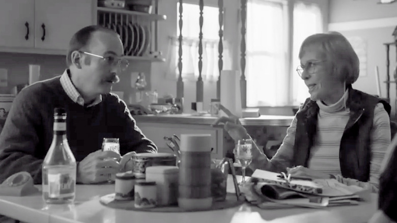 Gene and Marion talking at table