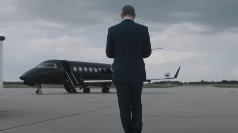 Jim Balsillie walking at airport