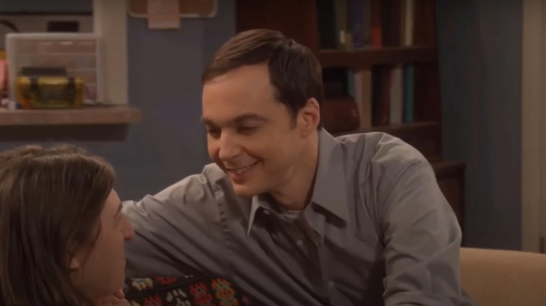 Jim Parsons smiling at Mayim Bialik