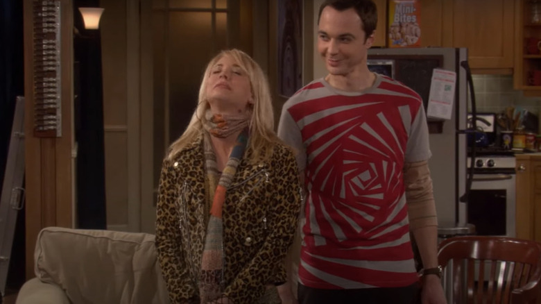 Jim Parsons smiling at Kaley Cuoco