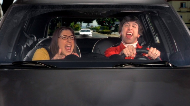 Amy and Howard singing in the car