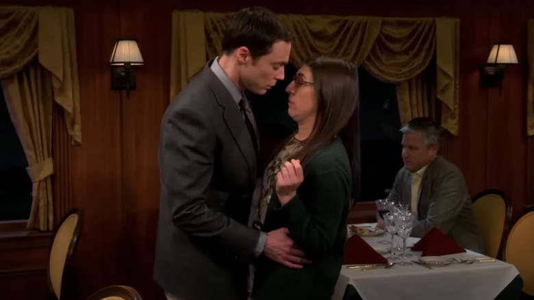 Sheldon and Amy embracing