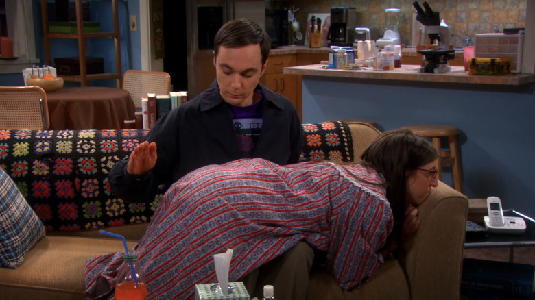 Sheldon spanking Amy on sofa