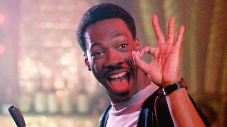 Eddie Murphy gives OK sign