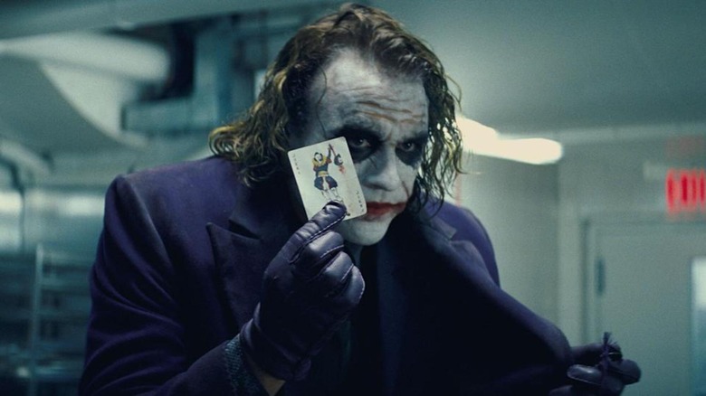 Joker with his card