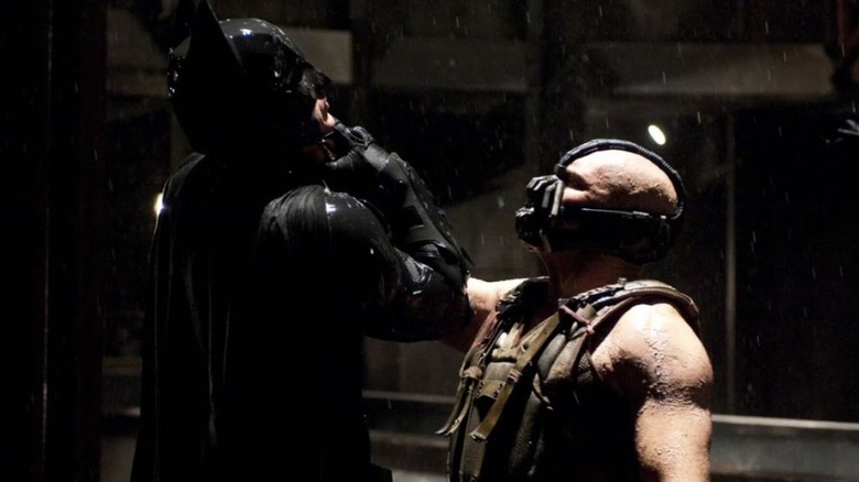 Bane choking Batman