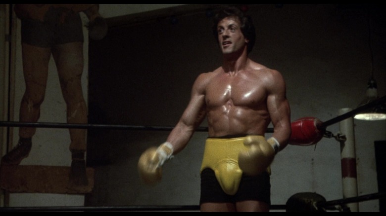 Rocky wearing yellow training trunks