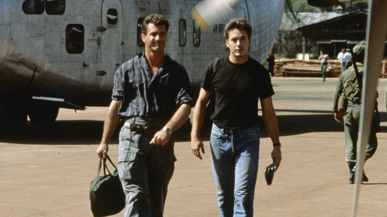 Gibson and Downey walk from plane