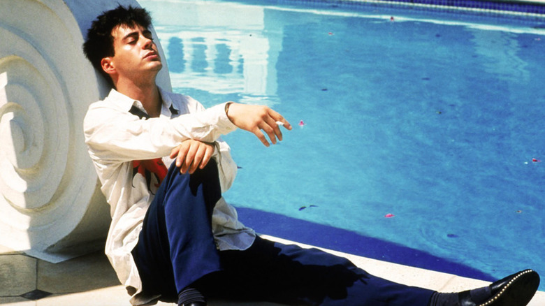 Downey smoking by pool