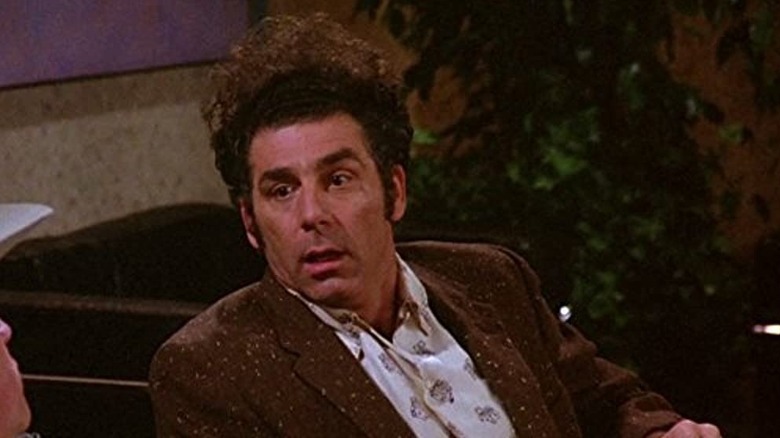 Kramer sits in the diplomats' club