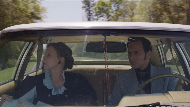 Lorraine and Ed Warren driving in car