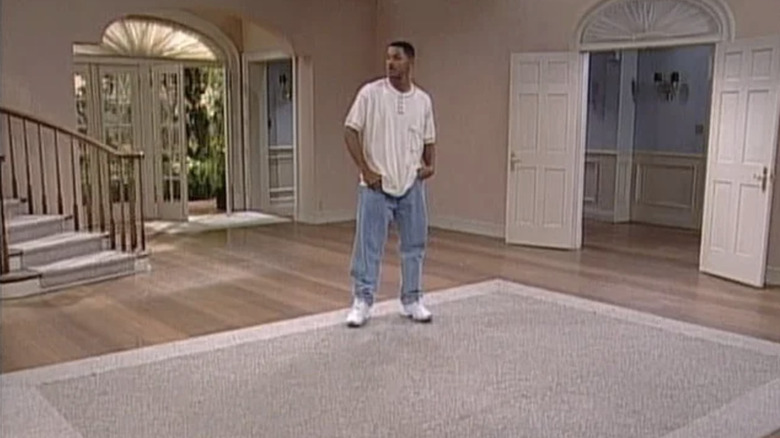 Will stands in empty living room