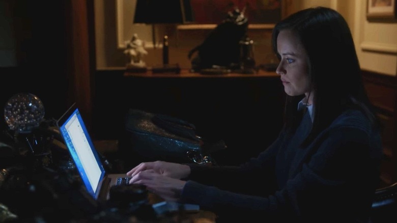 Rory typing on Richard's desk