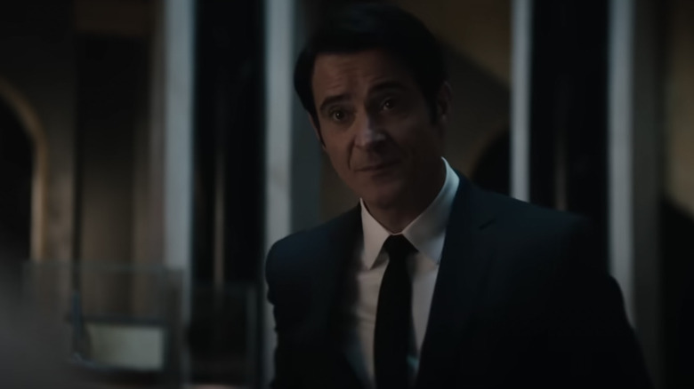 Goran Višnjić in a suit speaking encouragingly