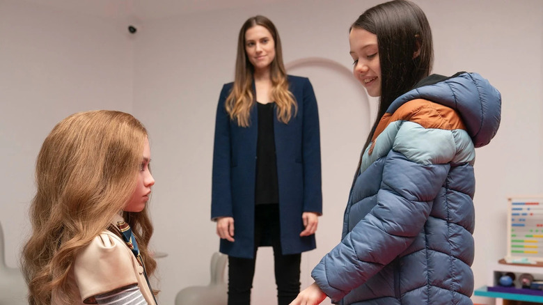 Gemma watches while Cady bonds with M3GAN