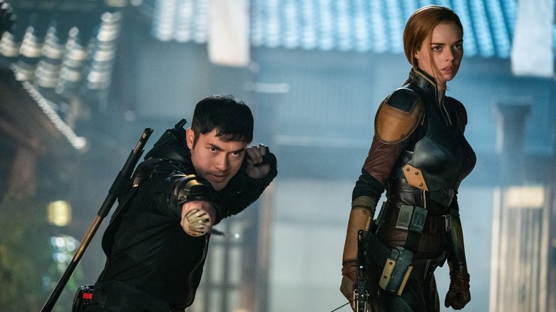 Henry Golding and Samara Weaving in "Snake Eyes: G.I. Joe Origins"