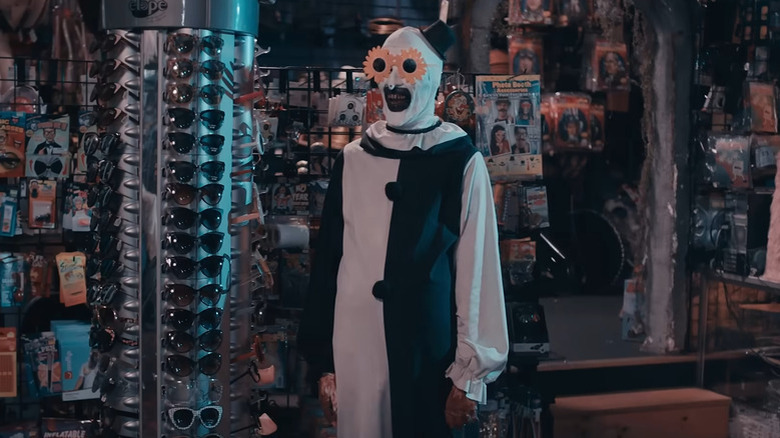 Art the Clown in costume shop Terrifier 2